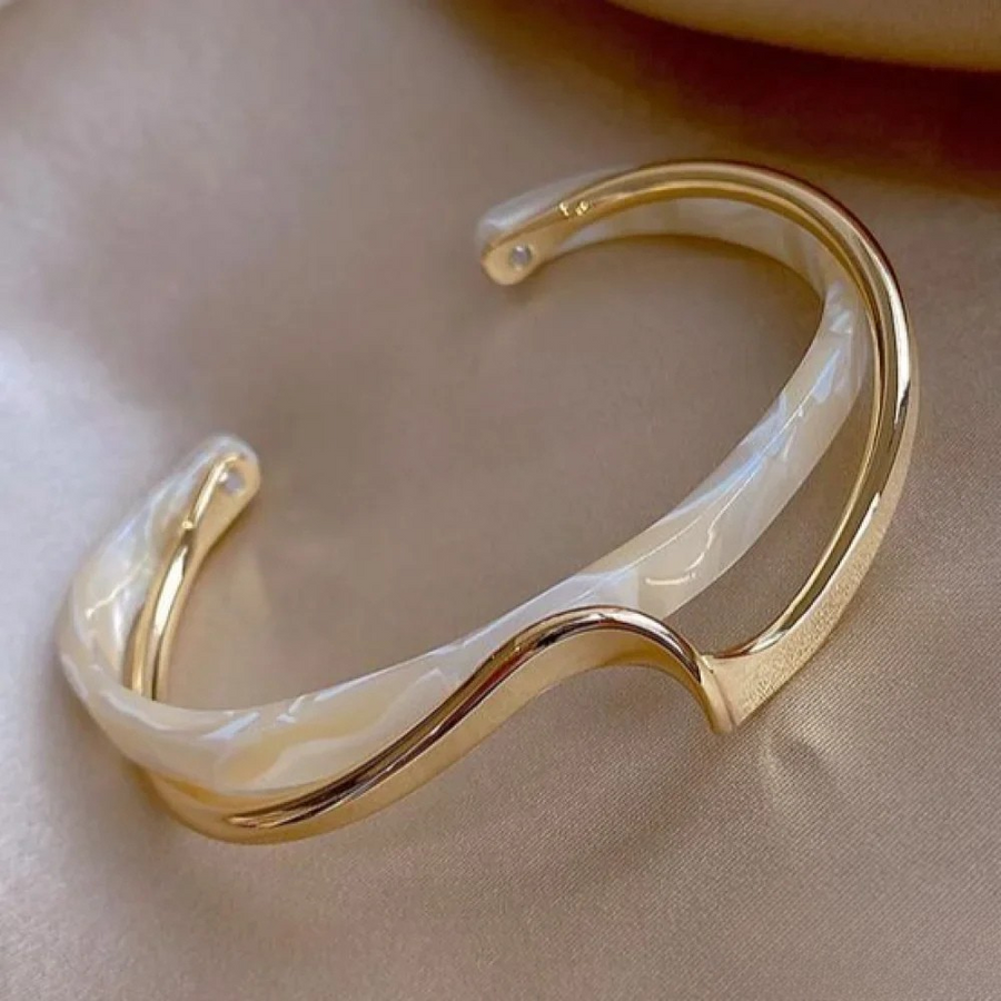 Golden bracelet with white opal