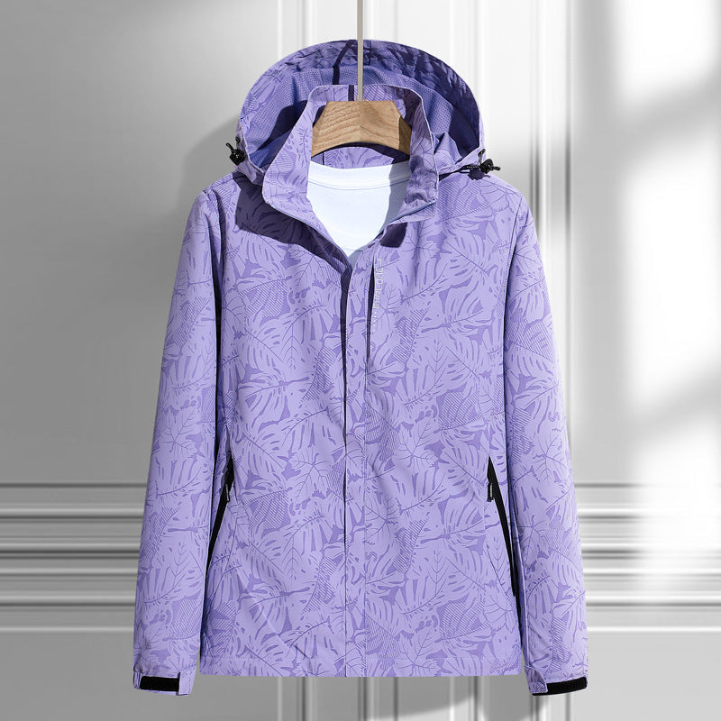 Women's lightweight rain and wind jacket with hood and leaf pattern