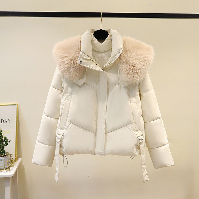 Women’s short quilted jacket with a voluminous faux-fur collar and waist belt
