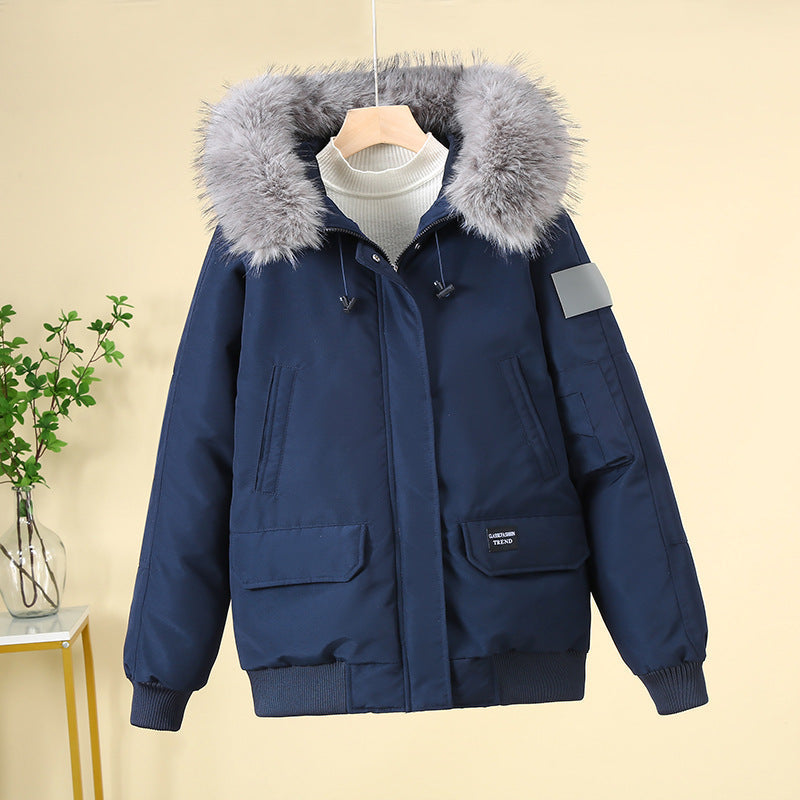 Women's padded bomber jacket with detachable faux-fur hood and ribbed cuffs