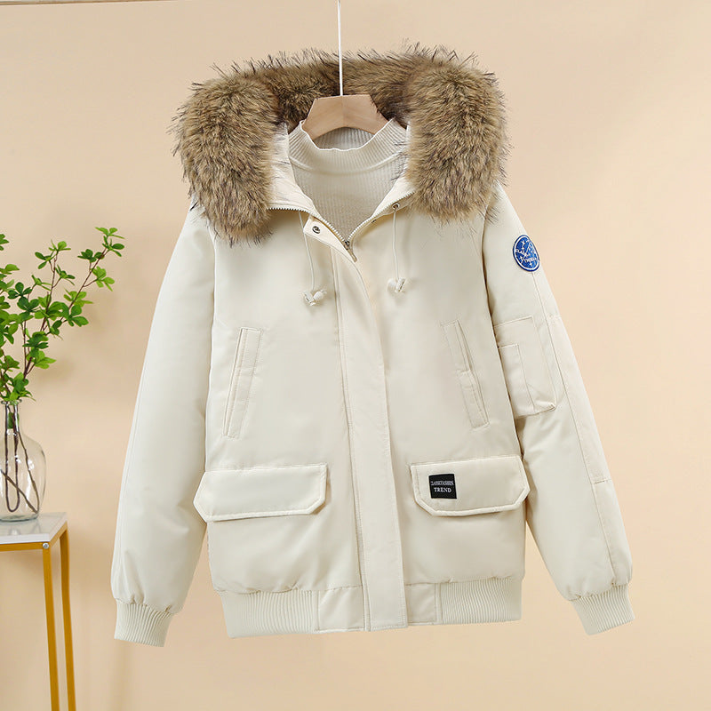 Women's padded bomber jacket with detachable faux-fur hood and ribbed cuffs