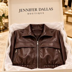 Women's cropped faux leather jacket in a Jennifer Dallas Boutique gift box