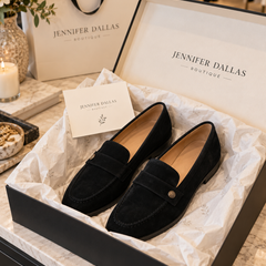 Noira black suede loafers in Jennifer Dallas Boutique packaging